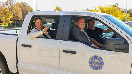 Division of Air Quality Director Bryce Bird, Director of Utah Division of Fleet Operations Cory Weeks, and Fleet Manager Dan Black take the Lightning for a test drive.