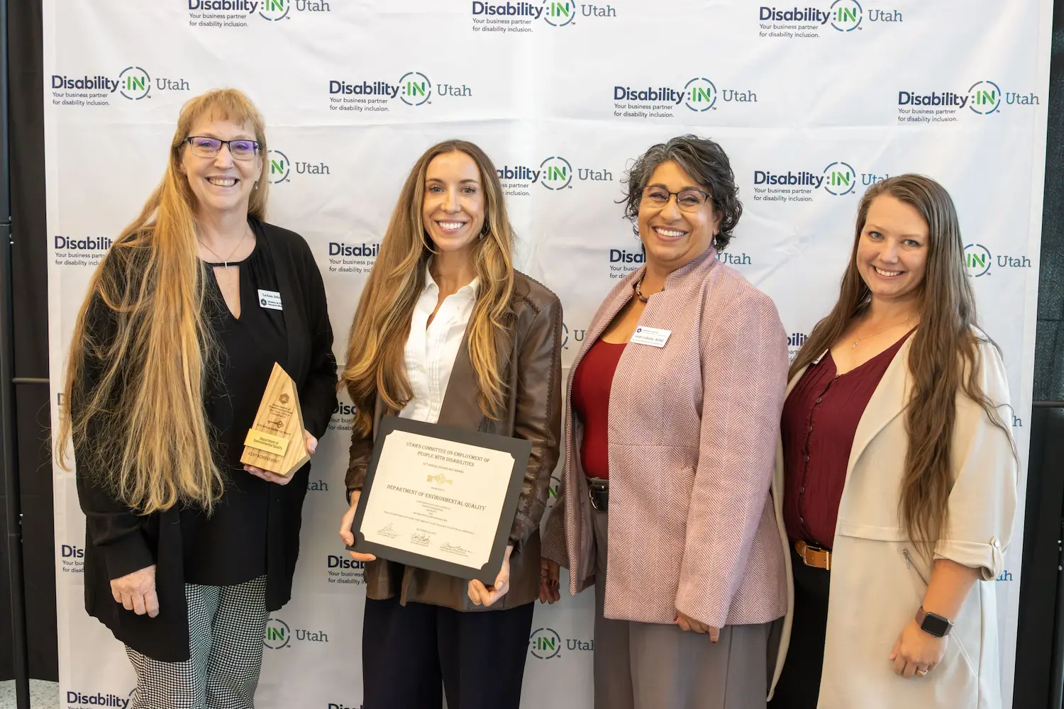 Four people accepting the ASAP Achievement for the Golden Key 2026 award.