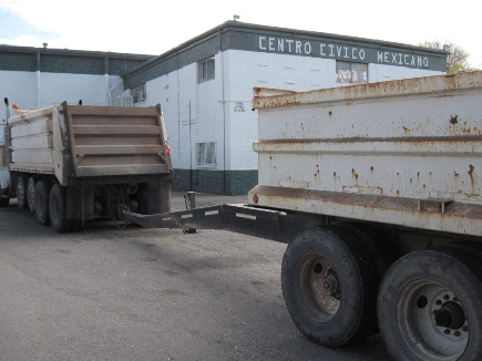Dump truck with trailer at Centro Civico Mexicano 