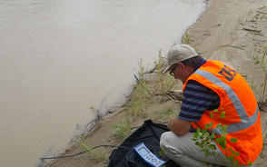 DEQ scientist sampling the San Juan River
