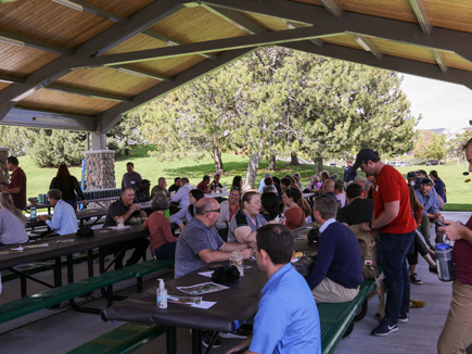 DEQ employees enjoying most excellent picnic food