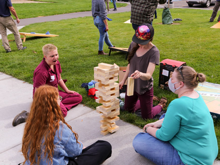 DEQ employees having a game of Giant Jenga