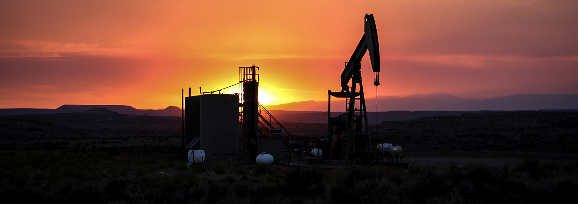 Sunset and pump jack in Utah's Uinta Basin