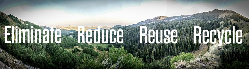 Wide landscape shot of forest with the words: Eliminate, Reduce, Reuse, Recycle 
