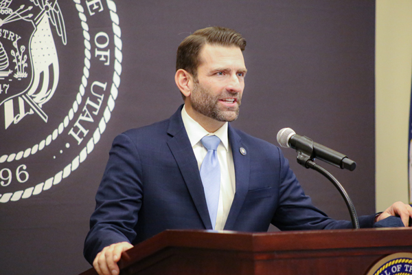 Image of L. Scott Baird speaking to an audience