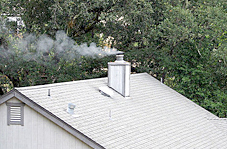 Chimney with smoke.