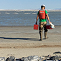 Image of a man walking along the Great Salt Lake